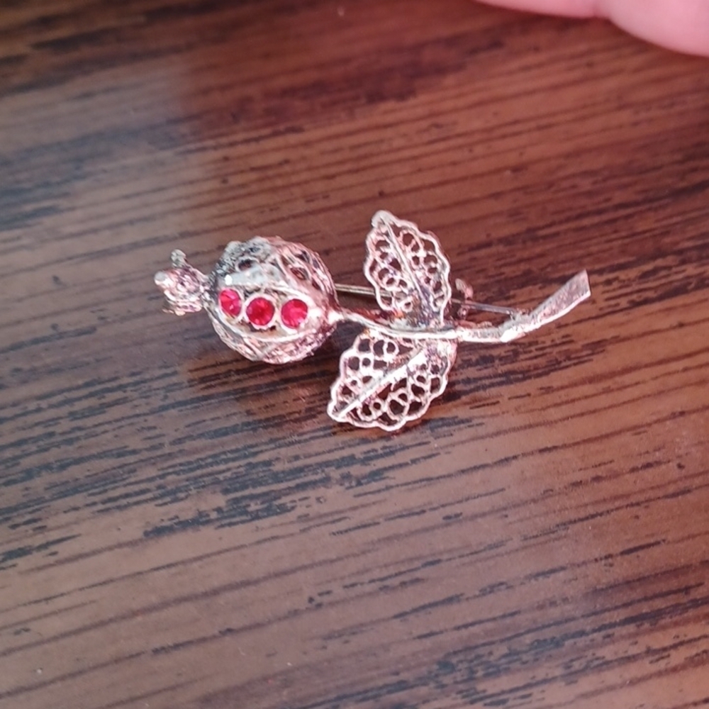 Rose Vintage Costume Pin, silver-tone filigree with red rhinestones